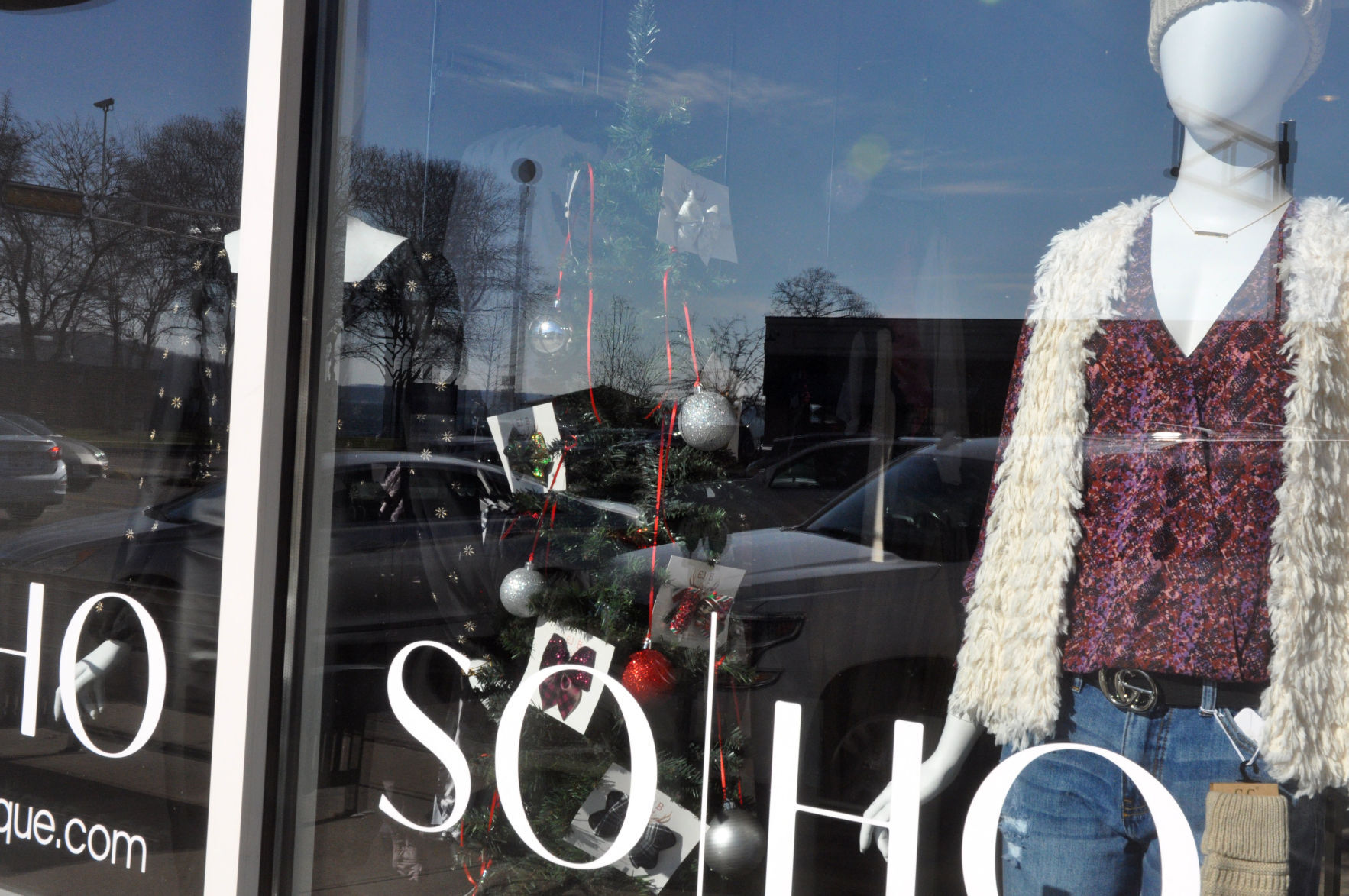 SoHo Boutique, 875 W. Main St., has placed a Christmas tree in their storefront window